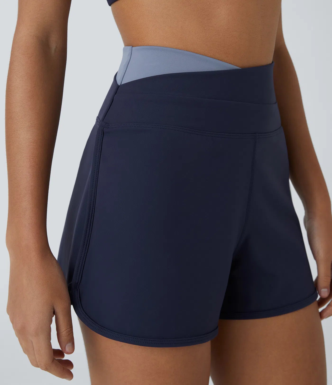 Softlyzero™ Plush High Waisted Yoga Short with Criss Cross Color Block and Curved Hem