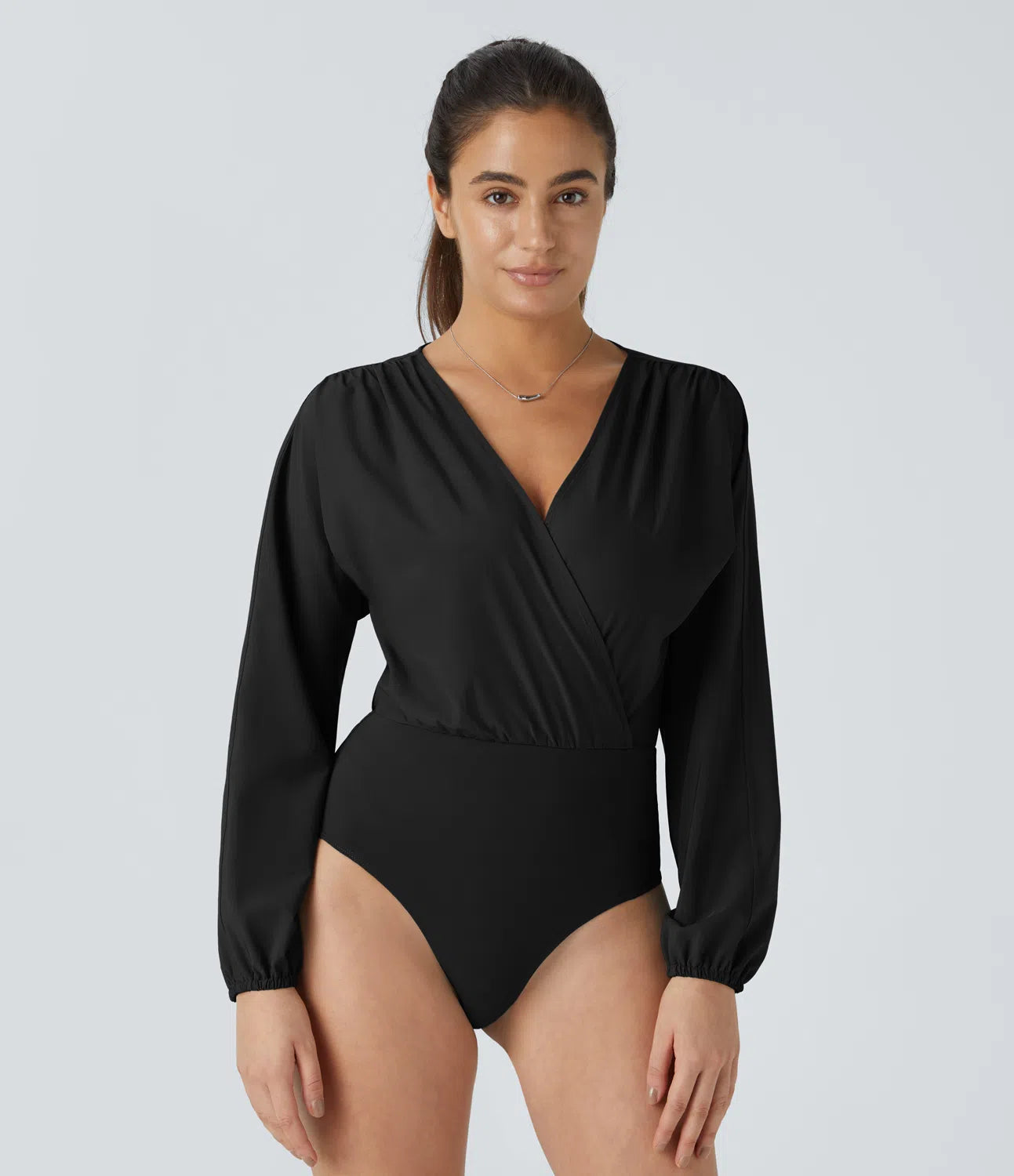 Body Breezeful™ à séchage rapide avec décolleté en V, manches évasées plissées et boutons-pression
