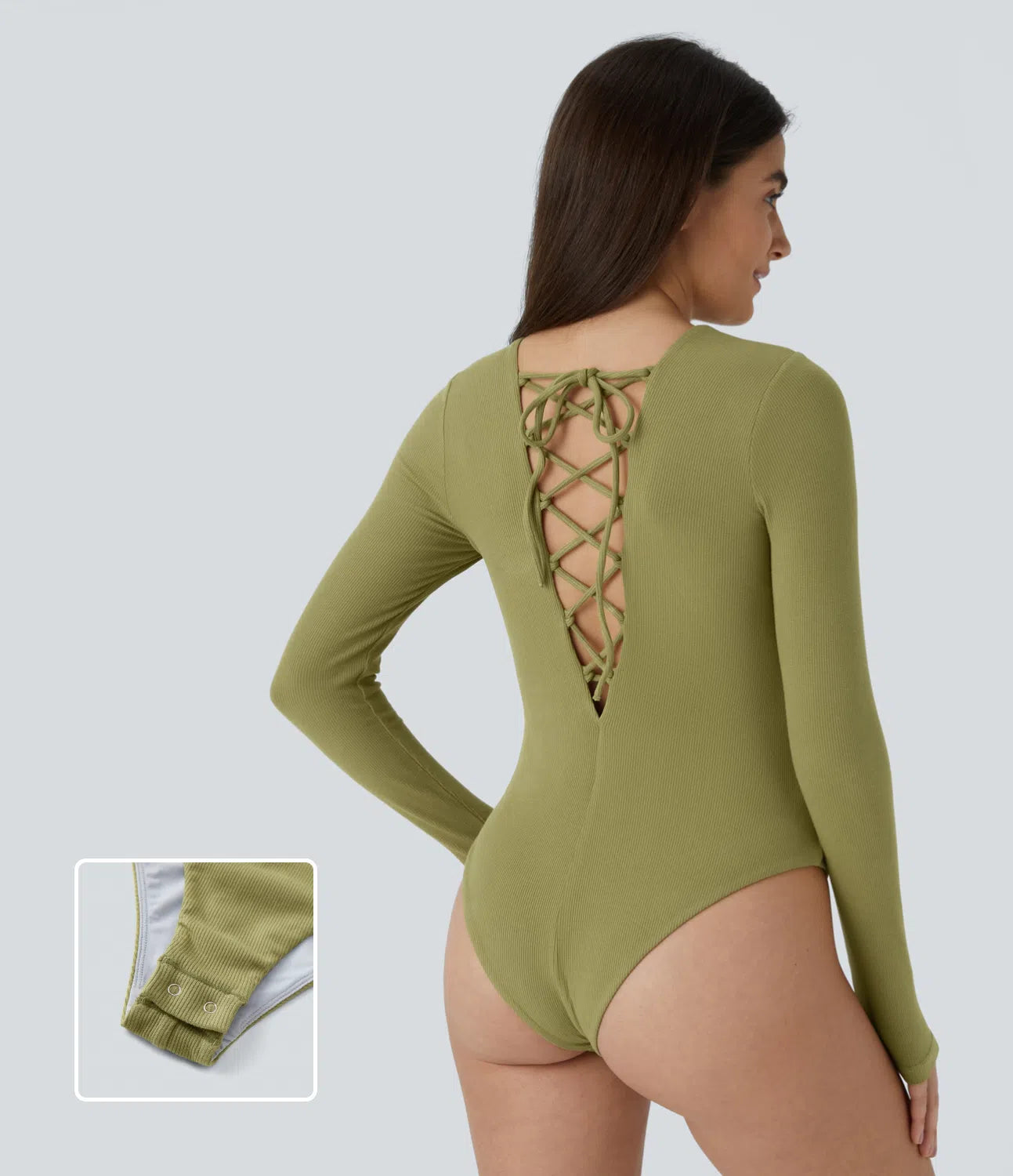 Casual ribbed knit bodysuit with crisscross lacing and long sleeves